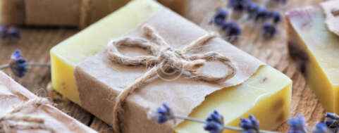 Lavander soap Lavender soap and salt on rustic wooden board. Spa concept